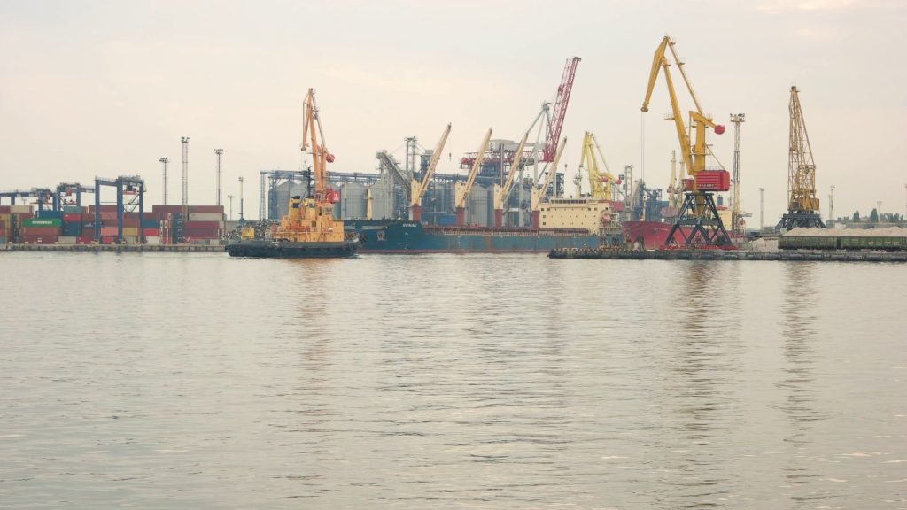 tugboat-and-port-cranes-at-the-harbor-ship-maintenance-and-repair-SBI-350032097